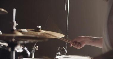 Man with drum kit playing music during live show video