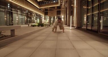 Cool break dancer performing on street video