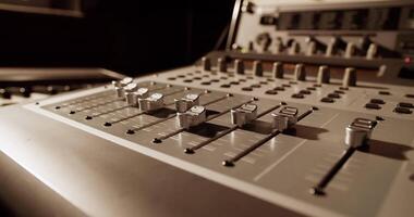 Control panel of mixing console in studio video