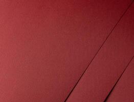 red paper texture with a matte woven finish. This deep, warm red material combines luxurious photo