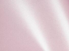 Soft pink paper texture with a pearlescent sheen and smooth, fibrous surface. The pastel tones and photo