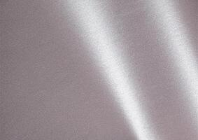 Soft gray paper texture with a glossy, metallic pearlescent finish in taupe, sepia, and a subtle photo
