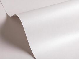 White paper texture with a glossy satin finish and subtle wavy shapes. The luminous surface features photo