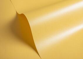 Pale gold paper texture with a glossy satin finish and a subtle gradient of creamy yellow tones. The photo