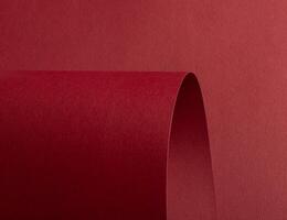 Red paper texture with a matte woven finish. This deep, warm red design offers a luxurious and photo