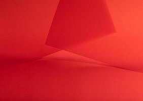 Scarlet red paper background with a smooth gradient and fine texture. Rich and vibrant tones with photo