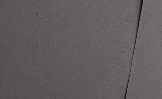 Grey paper texture. Blank and smooth surface with a simple and elegant pattern, perfect for modern photo