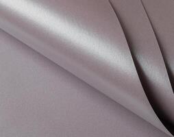 Soft gray paper texture with a metallic finish in taupe, sepia, and grayish pink with a subtle pink photo
