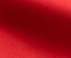 Crimson red paper texture with a soft matte finish and subtle gradients. The warm, vibrant tones and photo