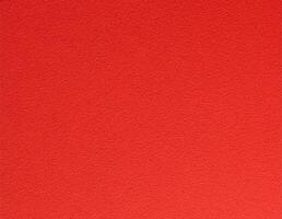 Crimson red paper texture with a smooth yet subtly textured surface, showcasing a warm and rich tone photo