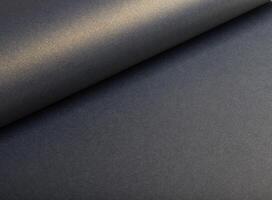Luxurious navy paper background with a sleek gradient and subtle grainy texture. Glossy metallic photo