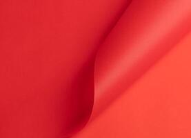 scarlet red paper background with a smooth gradient and subtle folds. Rich and vibrant color with a photo