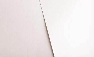 Elegant off-white paper background with a smooth matte surface and subtle gradient. Soft ivory tones photo