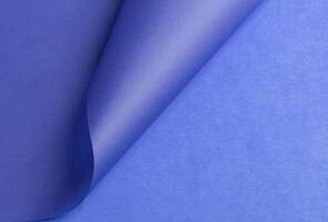 Elegant royal blue tracing paper background with a matte finish and subtle grainy texture. Featuring photo
