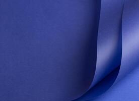 Luxurious royal blue paper background with a matte finish and subtle gradient. Featuring a grainy photo