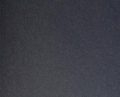 Elegant paper background with a muted blue and navy gradient. Grainy texture combined with a matte photo