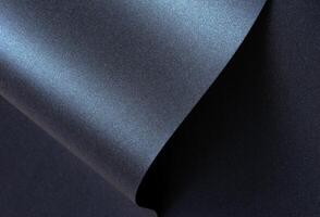 Luxurious blue paper background with a midnight blue gradient and glossy sheen. Smooth and photo