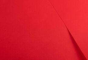 Luxurious red scarlet paper background with a smooth, vibrant texture and rich monochrome tones. photo
