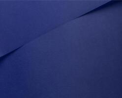 Elegant royal blue paper background with a matte finish and subtle gradient. Translucent texture photo