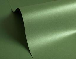 Luxurious green paper background with a soft satin texture and rich metallic sheen. Subtle gradient photo