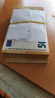 The Bundled Envelopes Are All Set and Ready for Dispatch to Ensure Efficient Delivery photo