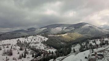 Flight over the winter landscape in the Carpathian mountains. 4K video
