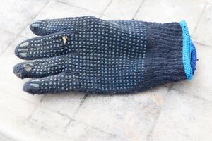 This is a Protective Work Glove that features an innovative Grip Design for enhanced usage photo