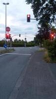 Traffic Lights and the Roadway during Dusk Time and the Beautiful Twilight Hours photo