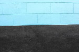 This is a captivating Minimalist Blue and Black Textured Wall Background for various uses photo