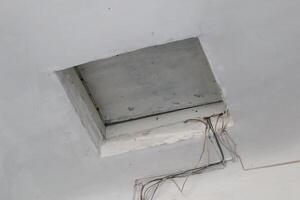Exposed Ceiling Access Point with Electrical Wires for Enhanced Accessibility and Aesthetics photo