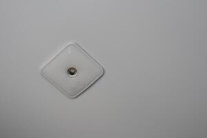 This is a stunning modern ceiling light fixture that features a chic minimalist design photo