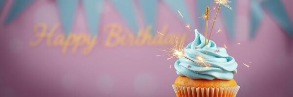 Delicious birthday cupcake with blue frosting and sparklers celebrating a joyful occasion photo
