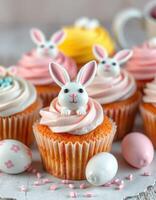 Colorful Easter cupcakes decorated with bunny toppers and pastel eggs perfect for a festive celebration photo