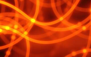 Vibrant orange abstract lines creating a dynamic pattern in a warm, glowing atmosphere photo