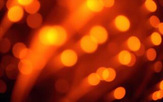 Bright orange sparks illuminate the night sky during a festive celebration with joy and excitement photo