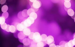 Colorful purple bokeh lights create a vibrant atmosphere perfect for celebrations or gatherings photo