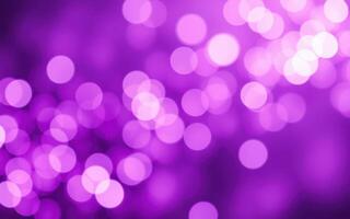 Vibrant purple bokeh lights create a dreamy atmosphere during an evening celebration or event photo
