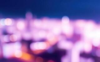 Colorful city lights create a vibrant background during twilight in an urban setting photo
