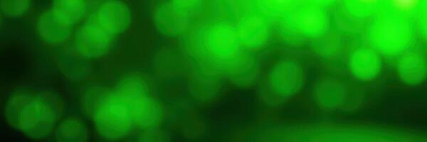 Colorful abstract background features various shades of green with a bokeh effect creating a vibrant and energetic atmosphere photo