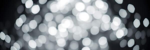 Elegant bokeh background creating a dreamy atmosphere with soft white lights at an evening event photo