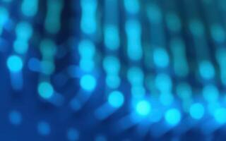 Colorful blue bokeh lights create a vibrant abstract background in a digital art setting photo