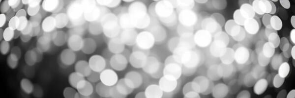Shimmering bokeh lights create an enchanting atmosphere during a festive evening celebration photo