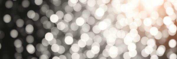 Soft bokeh lights create a dreamy atmosphere in a festive setting during nighttime celebrations photo