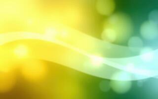 Abstract design with vibrant yellow and green waves blending and creating a soft bokeh effect in a serene background photo