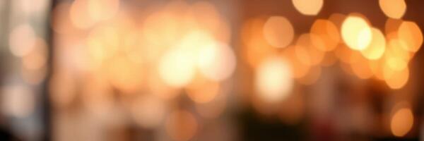 Warm golden bokeh lights create a soft atmosphere in a bustling cafe during an evening gathering photo