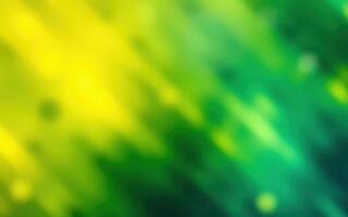 Vibrant abstract background in shades of green and yellow with flowing patterns creating a dynamic visual effect photo