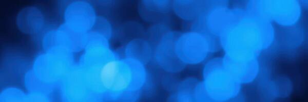 Abstract blue bokeh background with soft circular shapes creating a calming atmosphere for design purposes photo