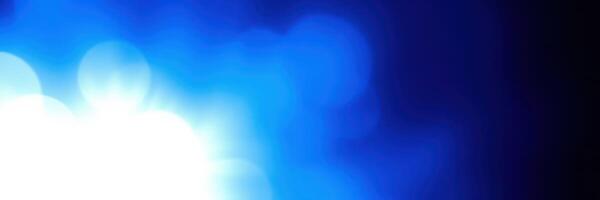 Soft blue light creates a calming atmosphere in a dimly lit space photo