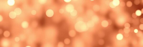 Golden bokeh lights create a warm atmosphere at an evening gathering photo