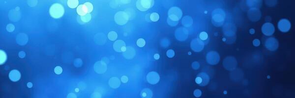 Vibrant blue bokeh background creating a serene and calming atmosphere for various artistic applications photo